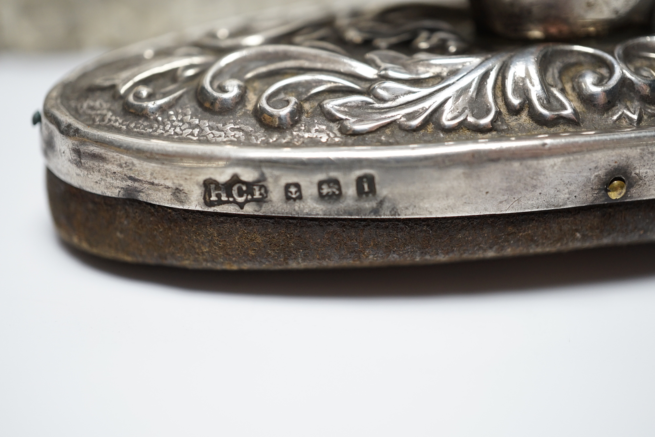 A cased silver christening egg cup and spoons and other items including nail buffers, inkwell, brushes etc.
